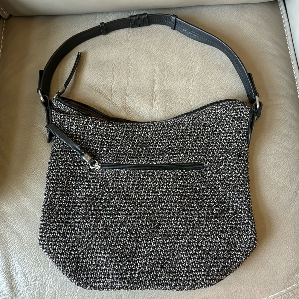 The Sak Sequoia Hobo
Hand Crocheted  Black/Brown static 
Leather strap